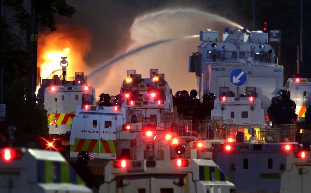 Police deploy water cannon as Northern Ireland unrest enters second night after Belfast stabbing email