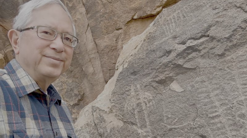 Elder Gerrit W. Gong stands next to petroglyphs in the Parowan Gap in Southern Utah in this undated photo  used in a video published by the Church on Sunday, June 7, 2026.