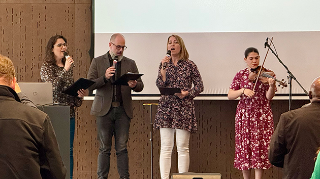 The Serbian praise and worship team leads out during an evening worship service at the TED Combined Advisories