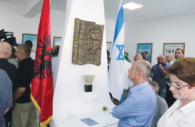 BERAT, DESIGNATED as a UNESCO World Heritage Site in 2008, served as a major hideout for the Jewish refugees fleeing the Nazi occupiers. Here, visitors attend the opening ceremony of the renovated Solomon Jewish History Museum in Berat in 2019.
