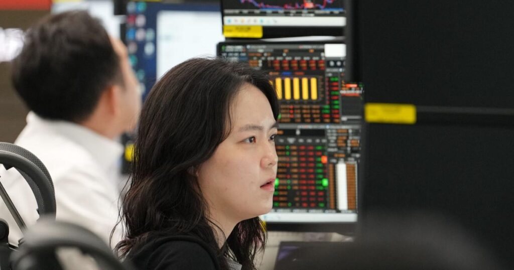 The Dow leaps to a record as oil prices ease and US stocks outside of AI rally | Business The Dow leaps to a record as oil prices ease and US stocks outside of AI rally | Business