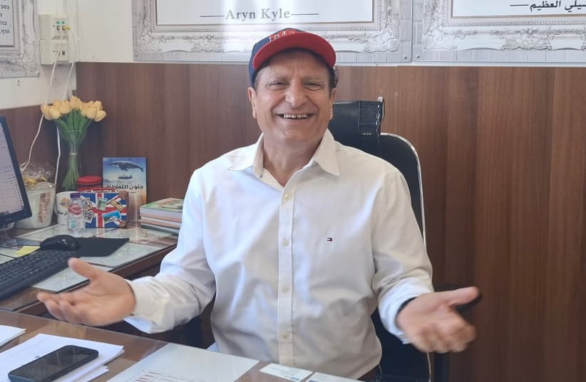 Wageeh Barakat, the principal at the high school run by Amal Educational Network in Yanuh Jat, at his desk.
