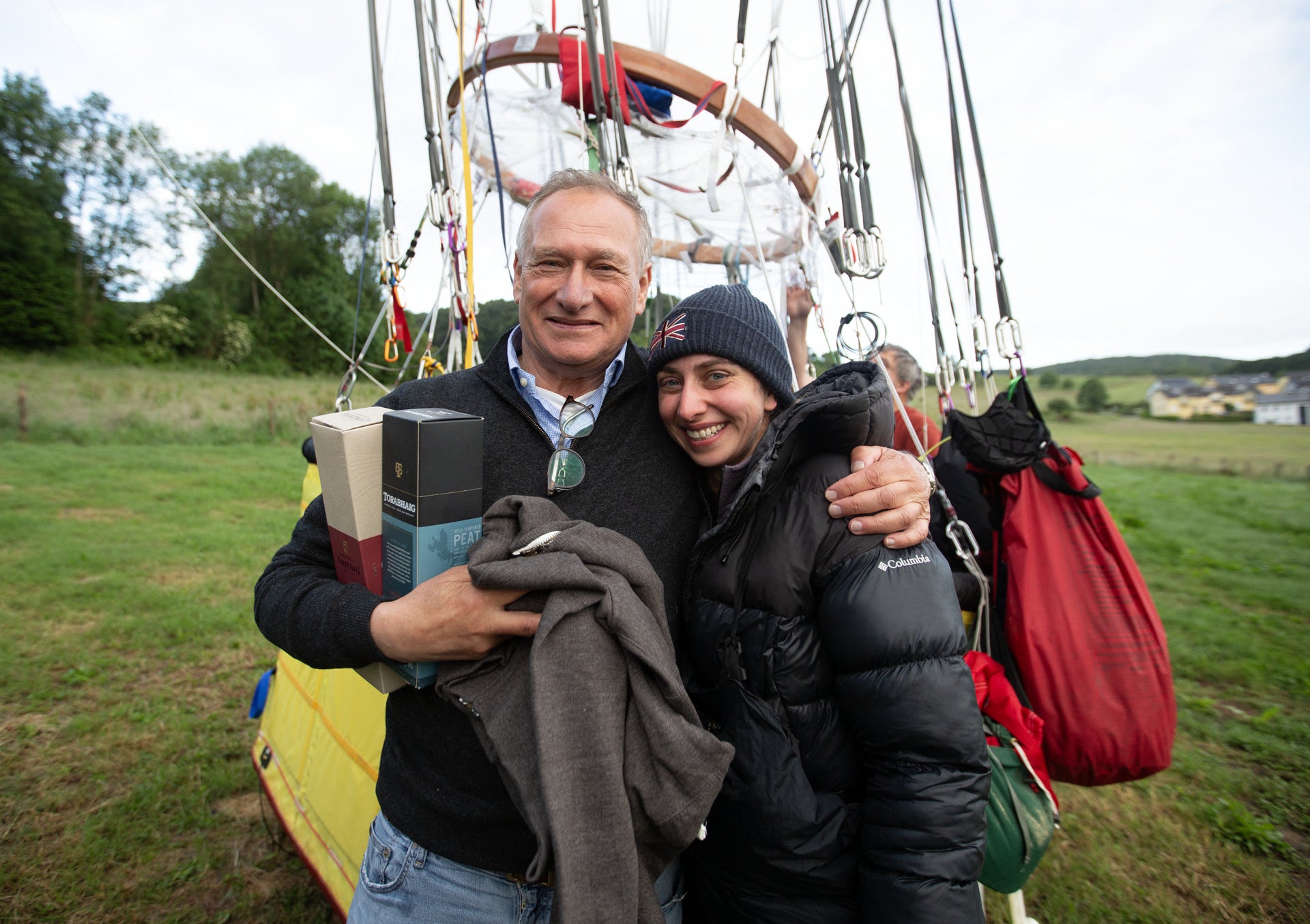 Sir David Hempleman-Adams with his daughter Alicia Hempleman-Adams after she landed in Luxembourg (Johnny Green/PA)