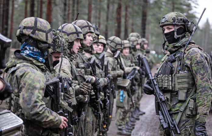 Finnish troops train in Niinisalo, Finland, Dec. 9, 2025. (Alessandro Rampazzo / Bloomberg / Getty Images)