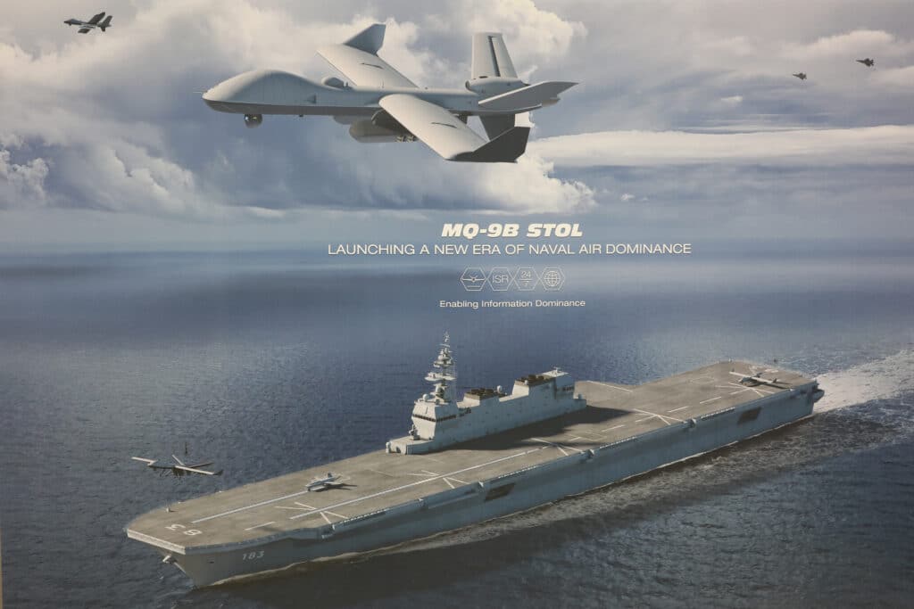 At DSEI Japan 2025, GA-ASI prominently displayed this image of MQ-9B STOL unmanned aircraft operating from the Japanese carrier JS Izumo. Picture by Gordon Arthur