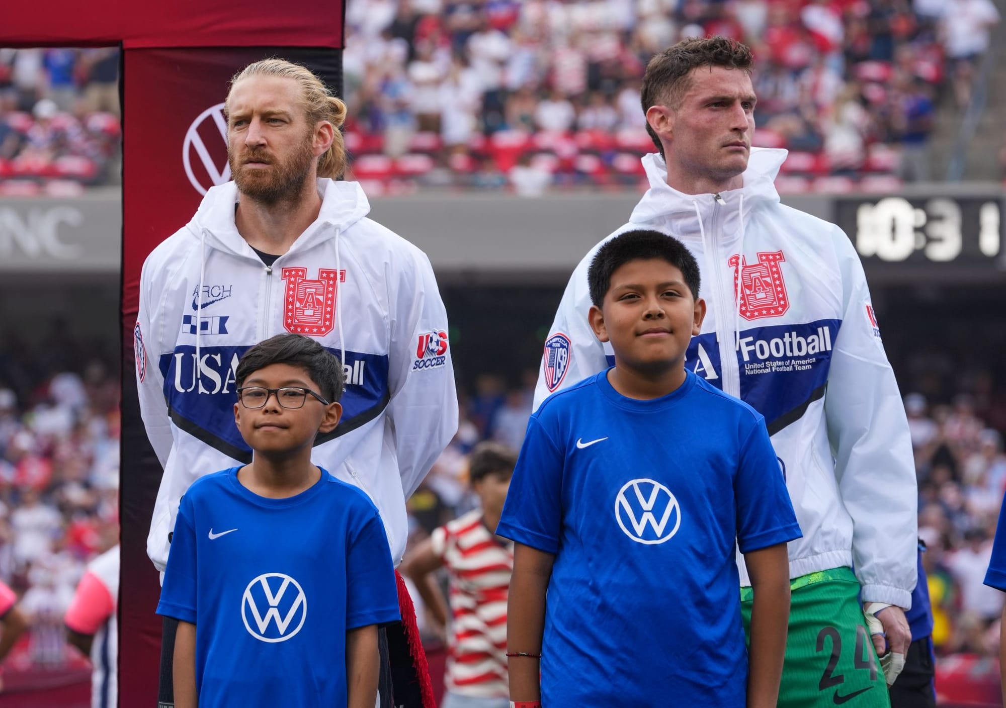 Tim Ream and Matt Freese along with mascots ahead of the the USMNT vs Germany friendly