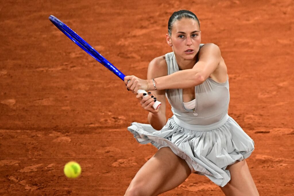 Marta Kostyuk, Mirra Andreeva set up Russia-Ukraine clash in French Open semifinals Ukraine's Marta Kostyuk returns a serve while beating Elina Svitolina during their quarterfinal matchup at Roland Garros in the French Open on Tuesday.