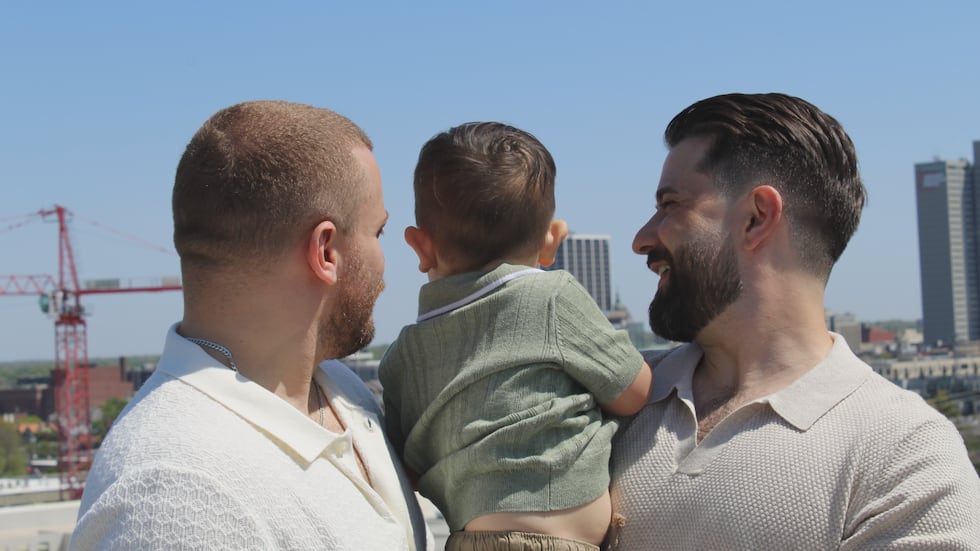 Travis and Thad Gerardot with their son