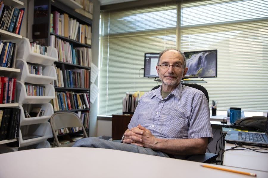 What makes a corporate comeback in the AI era Professor Alfred Marcus seated in his office