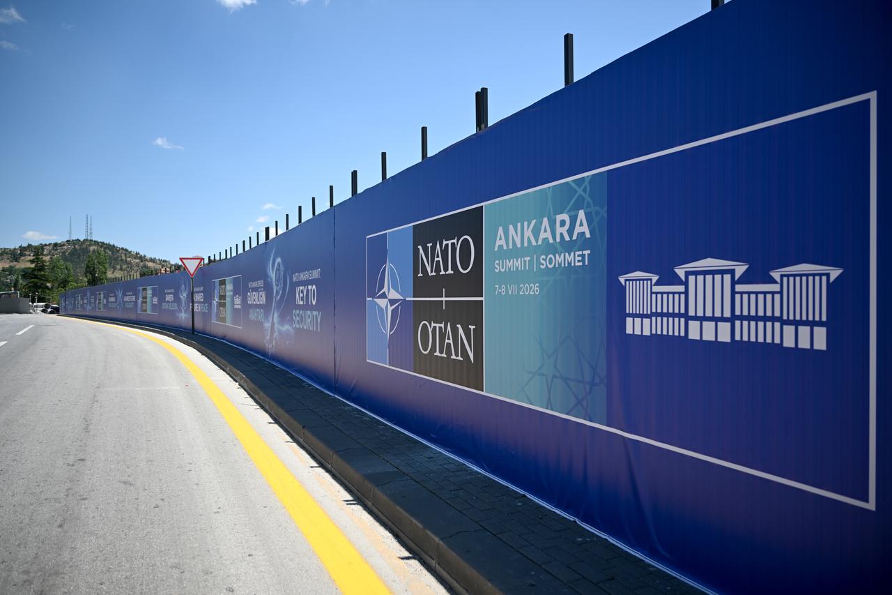 Billboards bearing the slogans “Key to Peace,” “Key to Security,” and “Shared Future in Peace” are seen at various points along the boulevard on the protocol route ahead of the NATO Summit as preparations continue in Ankara, Türkiye, on June 25, 2026. (AA Photo)
