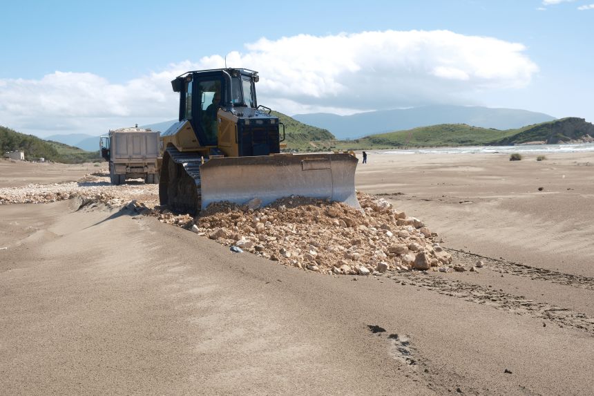 A photo provided by the conservation group PPNEA shows heavy machinery on Narta beach on the coast of Albania.