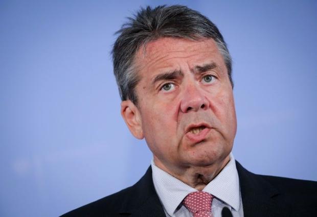 German Foreign Minister Sigmar Gabriel cut short his holiday to deliver the unusually strong message...