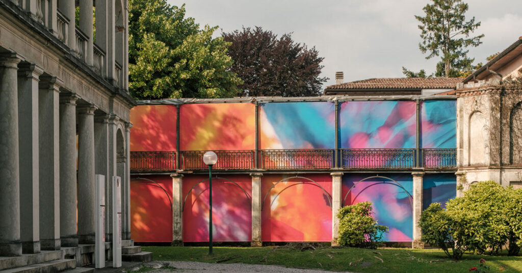 colorful textile installation reimagines historic laundry building in switzerland colorful textile installation reimagines historic laundry building in switzerland