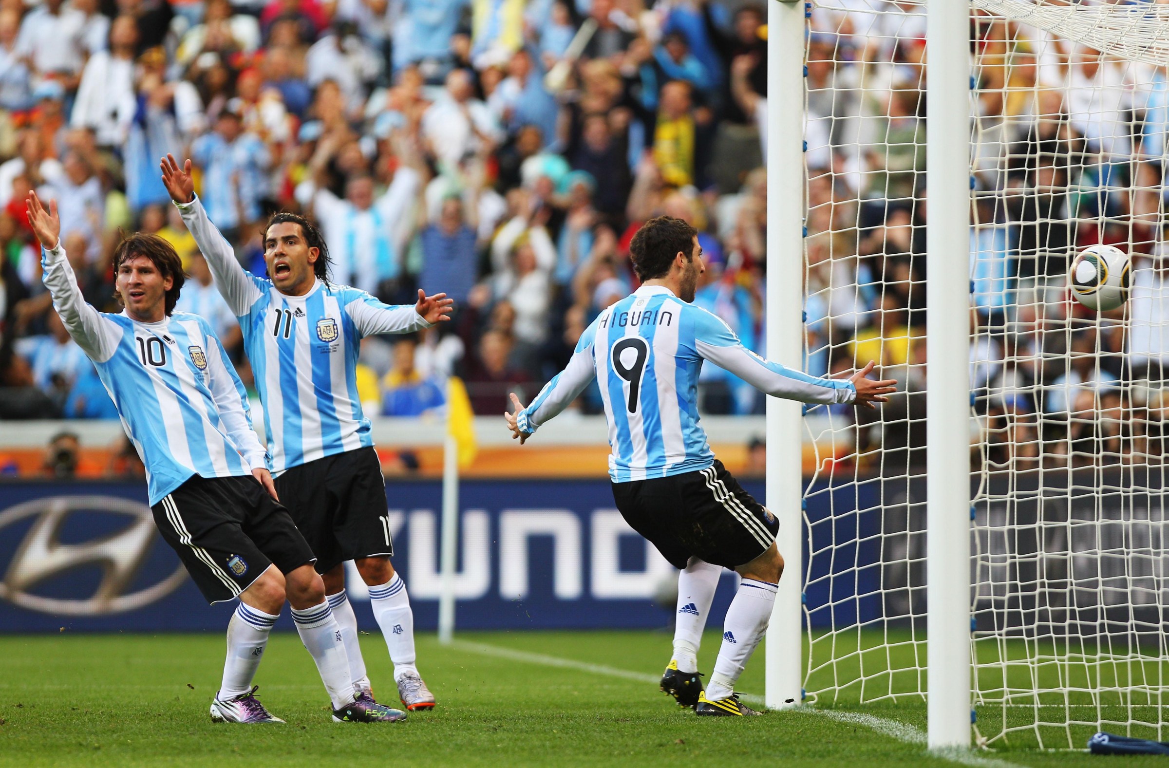 CAPE TOWN, SOUTH AFRICA - JULY 03: (L-R) Lionel Messi, Carlos Tevez and Gonzalo Higuain of Argentina appeal as they have a goal ruled offside during the 2010 FIFA World Cup South Africa Quarter Final match between Argentina and Germany at Green Point Stadium on July 3, 2010 in Cape Town, South Africa. (Photo by Paul Gilham - FIFA/FIFA via Getty Images)