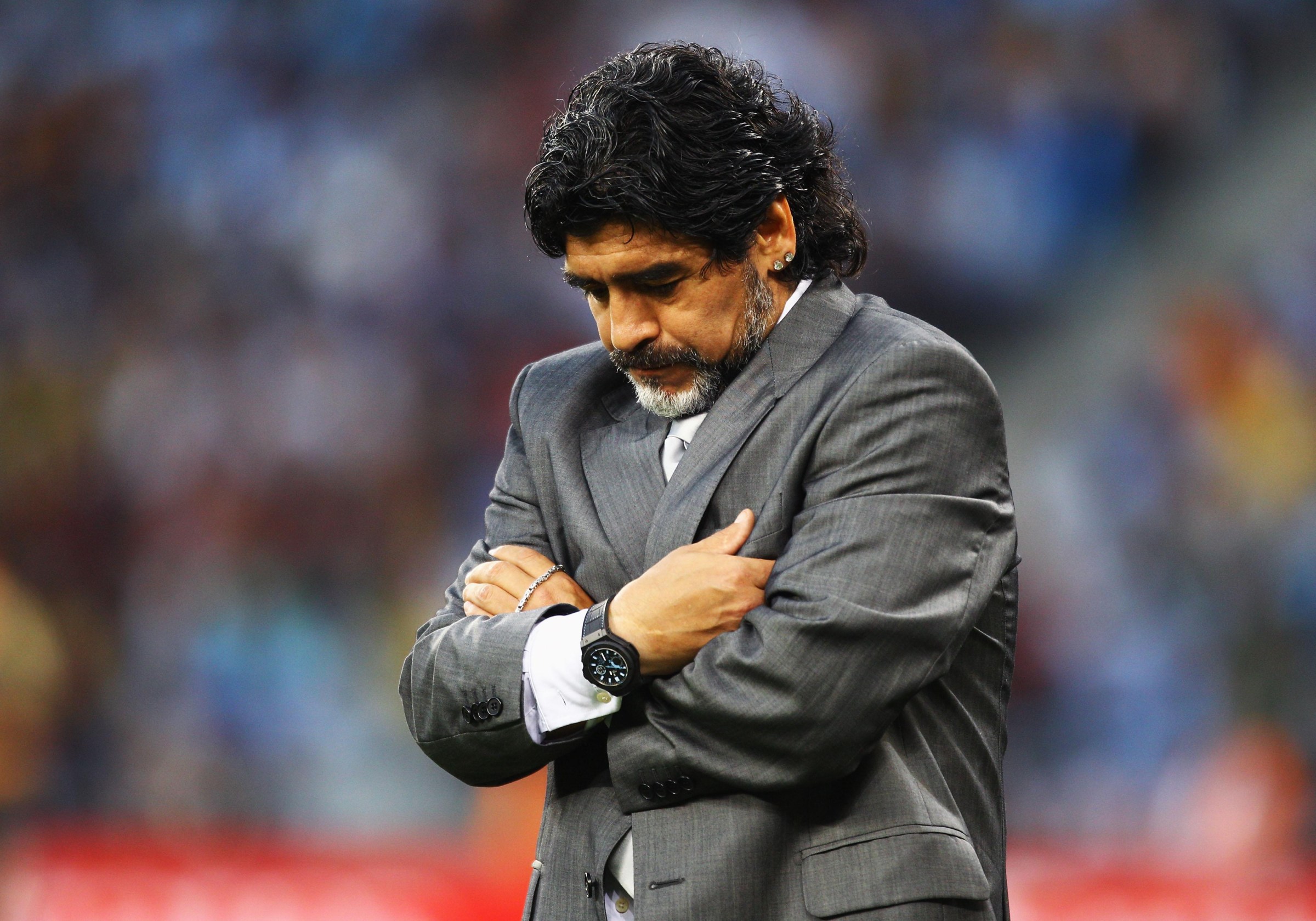CAPE TOWN, SOUTH AFRICA - JULY 03: Diego Maradona head coach of Argentina looks down with dejection during the 2010 FIFA World Cup South Africa Quarter Final match between Argentina and Germany at Green Point Stadium on July 3, 2010 in Cape Town, South Africa. (Photo by Jeff Mitchell - FIFA/FIFA via Getty Images)
