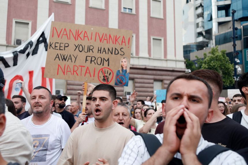 Protesters take part in a demonstration in Tirana, demanding transparency around the planned luxury resort project backed by Ivanka Trump.