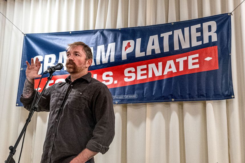 Graham Platner speaks to voters at a town hall on Sunday in Portland, Maine.