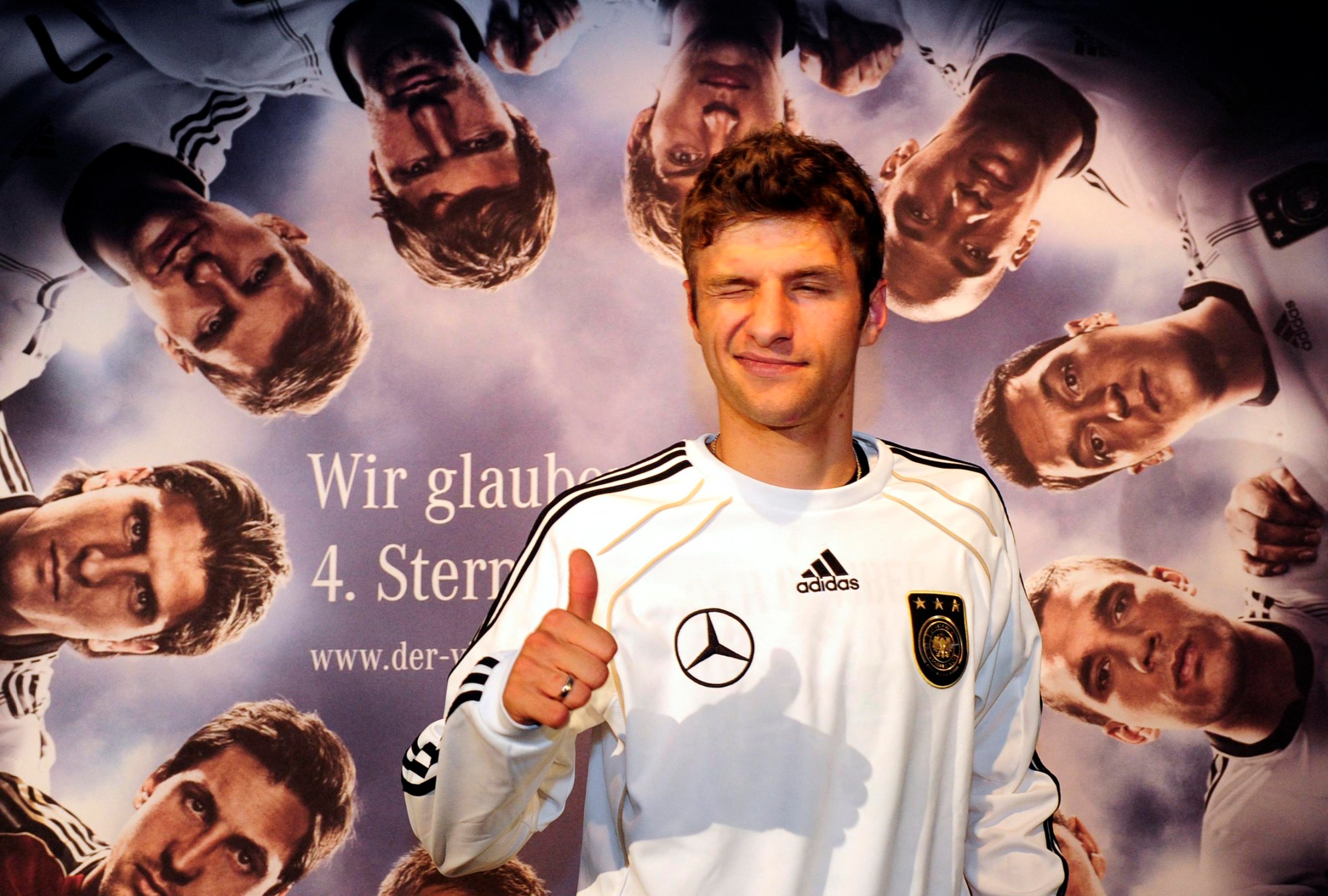 Germany’s striker Thomas Mueller gives a thumbs up as he poses for photographers following a press conference at the Velmore hotel in Erasmia near Pretoria on June 30, 2010. Germany will face Argentina in their 2010 Football World Cup quarter-final match in Cape Town on July 3, 2010. AFP PHOTO / JOHN MACDOUGALL (Photo by JOHN MACDOUGALL / AFP via Getty Images)