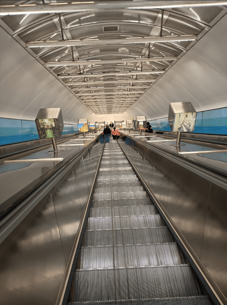 Phew, those Metro Tunnel escalators sure are steep! I suggest we install some "anti vertigo" photo cubes like those at Parliament station, but what to put on them? (for funsies)