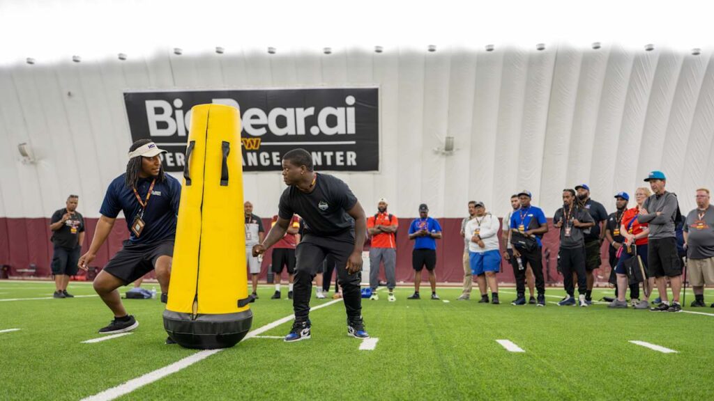 Commanders open BigBear.ai Training Center for youth football clinics Washington Commanders logo