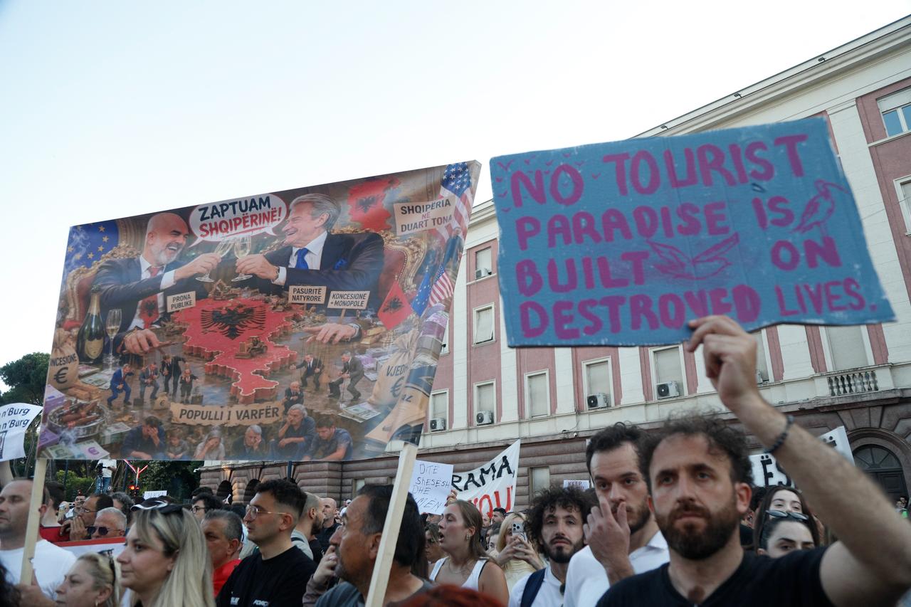 Protestors take part in a demonstration in front of the prime minister's office, against the construction of a luxury resort near a protected natural area, in Tirana on June 2, 2026. (AFP Photo)