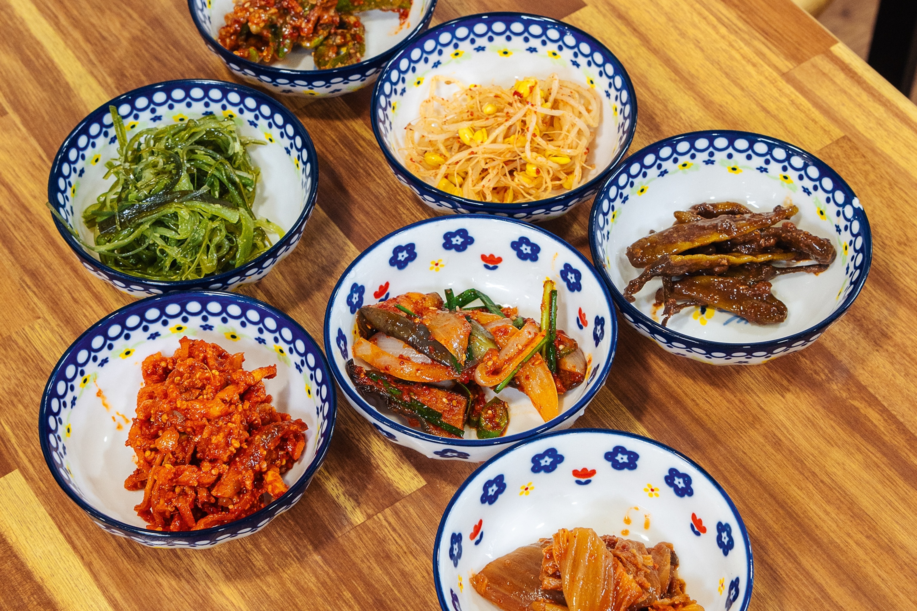 Selection of small dishes on table.