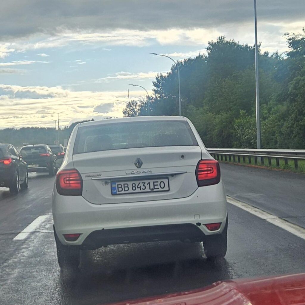 Car with Ukrainian license plate and bullet holes Car with Ukrainian license plate and bullet holes