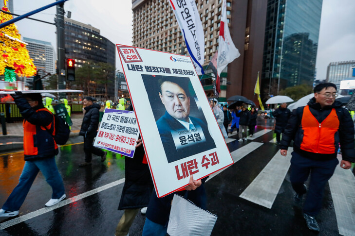 Former South Korean President Yoon sentenced to 30 years in prison over North Korea drone case logo