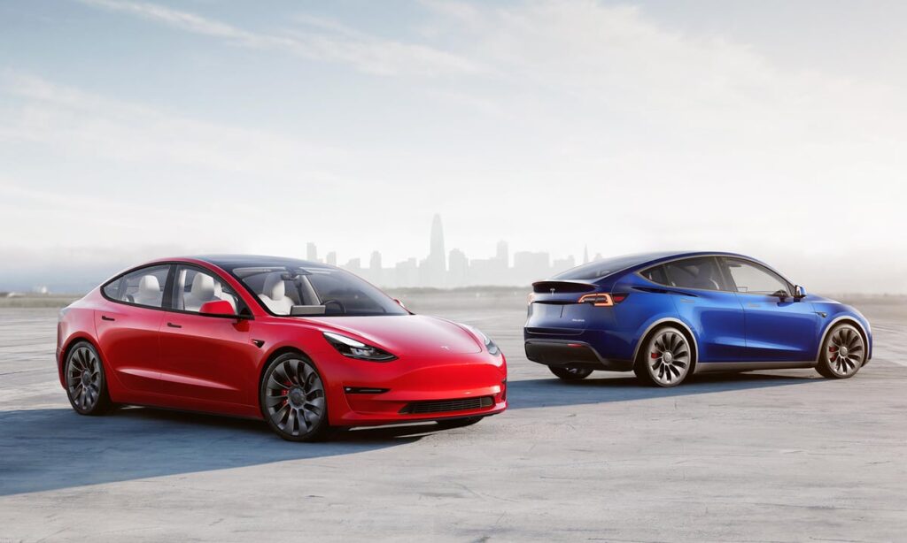Two Teslas on the road.