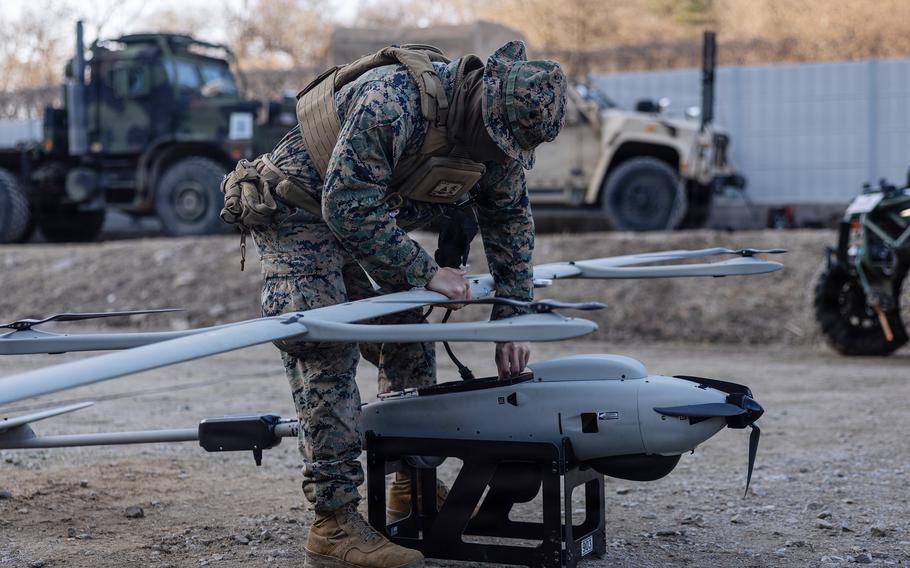 A U.S. Marine Corps drone operator assembles a small unmanned aircraft system during a bilateral combined-arms live-fire range in Gimpo, South Korea, March 18, 2026. 
