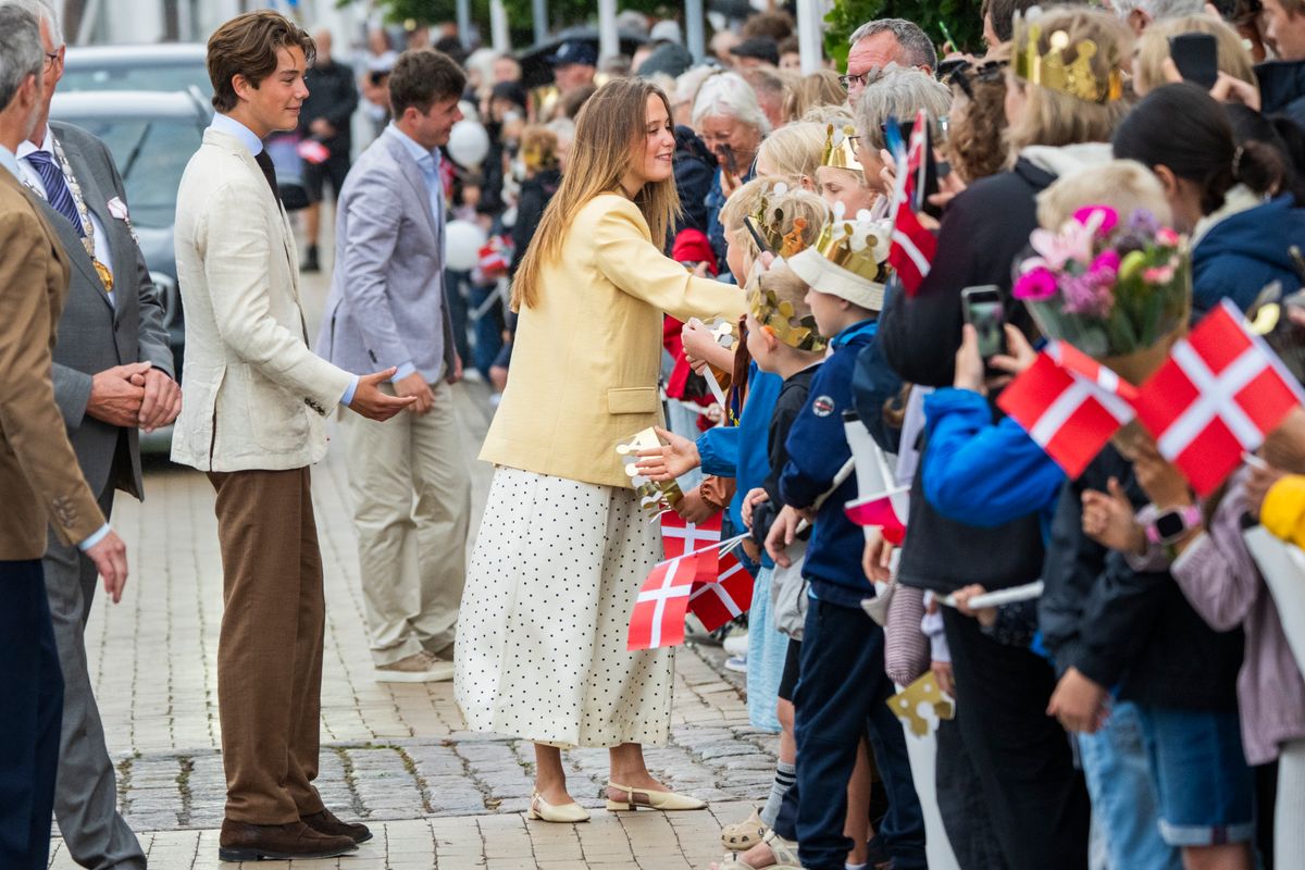 Princess Josephine smiles as she greets royal well-wishers during the traditional welcome at Gråsten Palace.