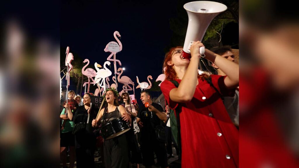 Why a former Soviet base is at the heart of Albania’s eco-protest Protesters hold flamingo-shaped placards as they demonstrate against the government, following weeks of protests against a planned luxury resort backed by a company linked to Jared Kushner, the son-in-law of U.S. President Donald Trump, on an environmentally sensitive part of the Adriatic coast, in Tirana, Albania, June 26, 2026. REUTERS/Florion Goga
