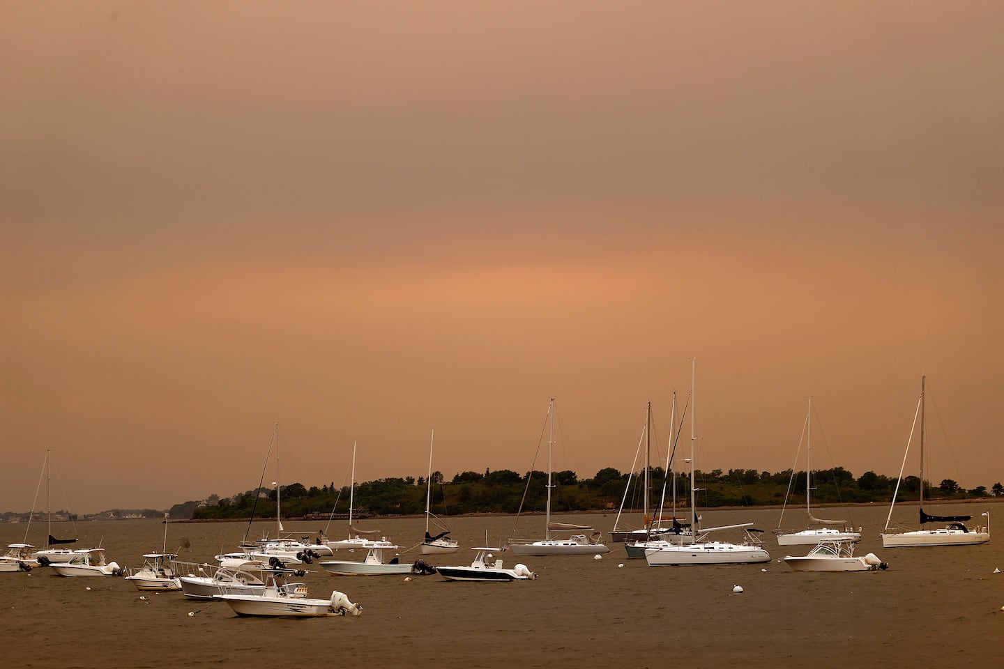 Hazy, smokey at dusk in Hingham from the Canadian fires on July 15.