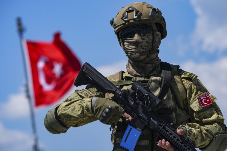 IZMIR, TURKIYE - MAY 15: Bayraktar TB3 Unmanned Aerial Vehicle (UAV) is transported to the flight deck via elevator after inspection during the EFES-2026 Combined, Joint Live-Fire Field Exercise in Urla district of Izmir, Turkiye on May 15, 2026. TCG Anadolu, a multi-purpose amphibious assault ship belonging to Turkish Naval Forces Command, is anchored off the coast of Urla for the operation. (Photo by Mehmet Emin Menguarslan/Anadolu via Getty Images)