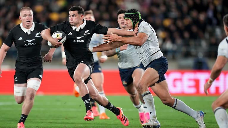 All Blacks wing Josh Moorby goes on the charge on debut against Italy.