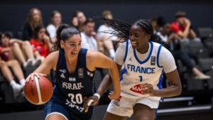 Maya Zilbershlag of Israel drives past France’s Sarah Cisse, the tournament’s Most Valuable Player, during the FIBA U20 Women’s EuroBasket championship game in Vilnius, Lithuania, July 12.
