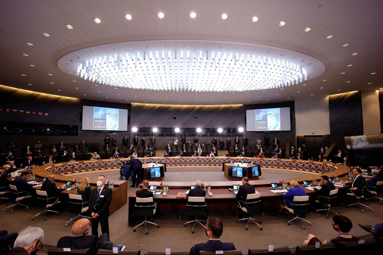 NATO Military HQ Intern Arrested for Espionage: Alliance Vetting Blind Spot Exposed NATO heads state gather plenary session NATO