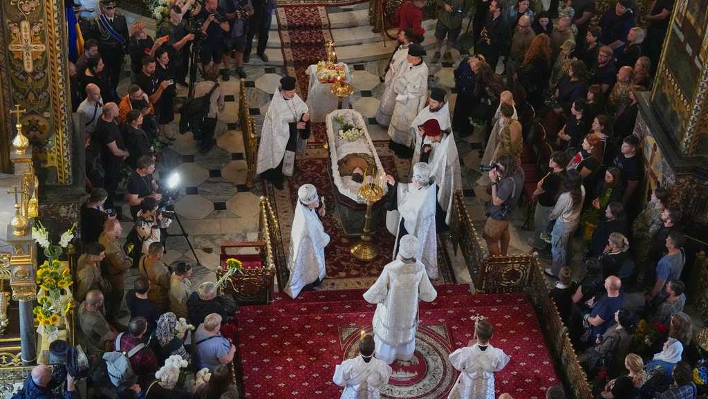 Ukraine honors ‘collector of souls’ who recovered war dead Ukraine honors 'collector of souls' who recovered war dead