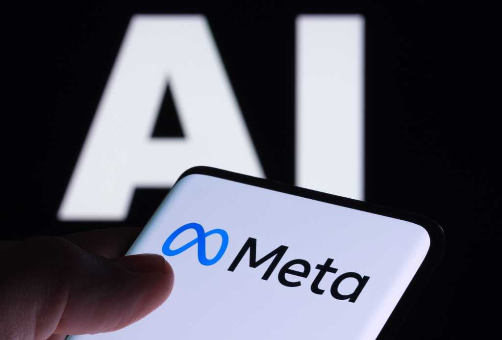 Meta’s new local model forces enterprises to recalculate AI costs and ROI – Computerworld Meta logo seen on smartphone and AI letters on the background. Concept for Meta Facebook Artificial Intelligence. Stafford, UK, May 2, 2023