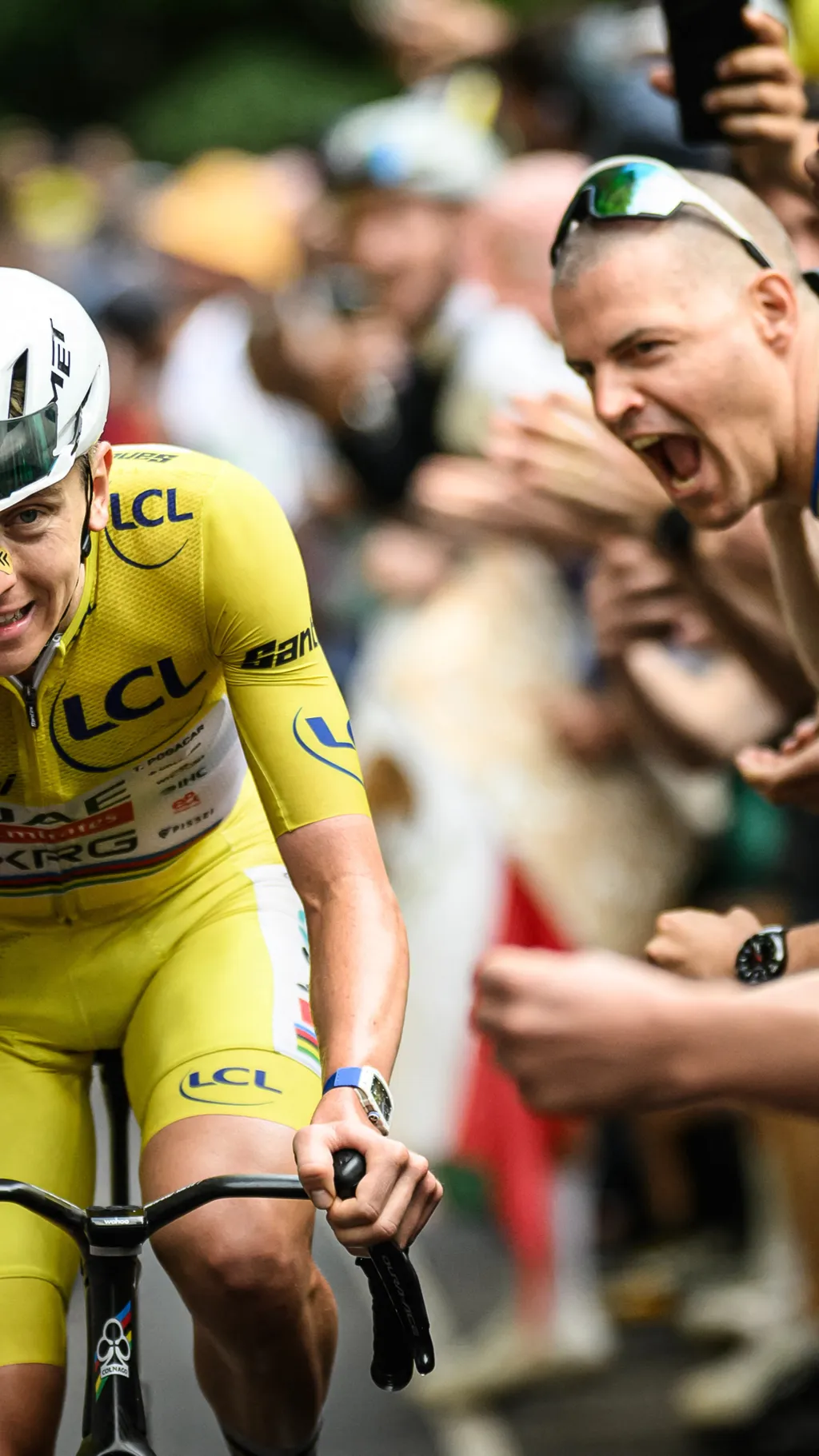<p>UAE Team Emirates - XRG Slovenian rider Tadej Pogacar, wearing the yellow leader's jersey, finishes the final stage of Stage 14 of the Tour de France cycling race on the route between Mulhouse and Le Markstein in the Vosges Mountains, France, July 18, 2026. </p>