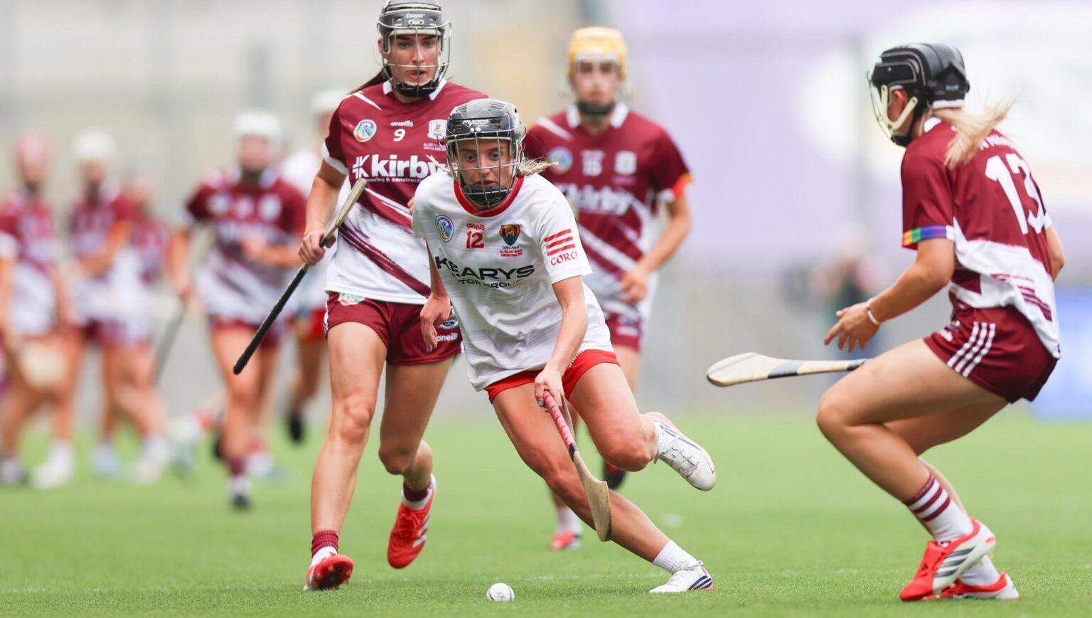 ‘First proper one’ but it’s All-Ireland camogie winners medal number two for Millie Condon Cork's Millie Condon is challenged by Carrie Dolan and Niamh Niland. Pic: ©INPHO/Tom Maher.