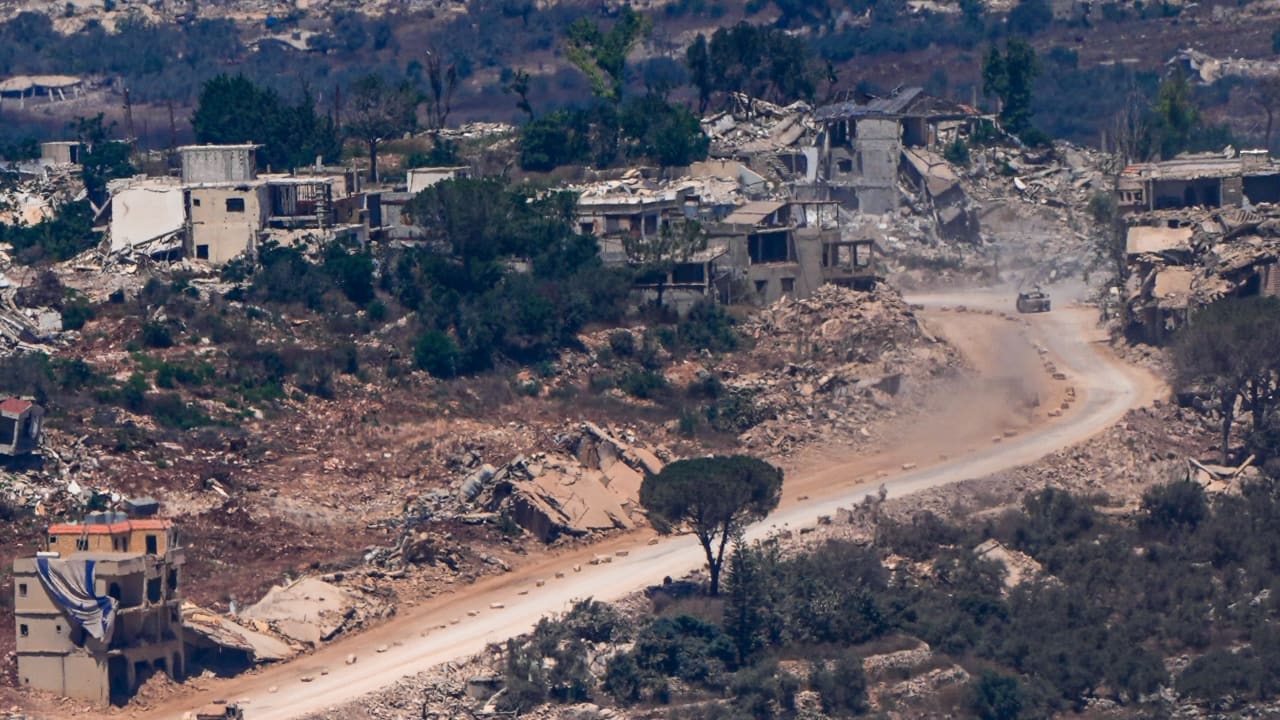 Israeli soldiers are seen inside southern Lebanon as seen from the Israeli side of the border, August 6, 2026.