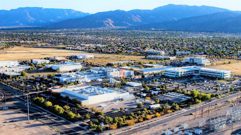 <strong>The Sandia Science & Technology Park is credited with generating $8.6 billion in wages, nearly 6,600 jobs and $4.85 billion in taxable consumer spending since 1998.</strong> (Photo courtesy of Sandia National Laboratories) Click on the thumbnail for <a href="https://newsreleases.sandia.gov/app/uploads/sites/275/2026/08/TechnologyParkAerials_2026-08-07-1.mp4">b-roll</a> of the SS&TP.