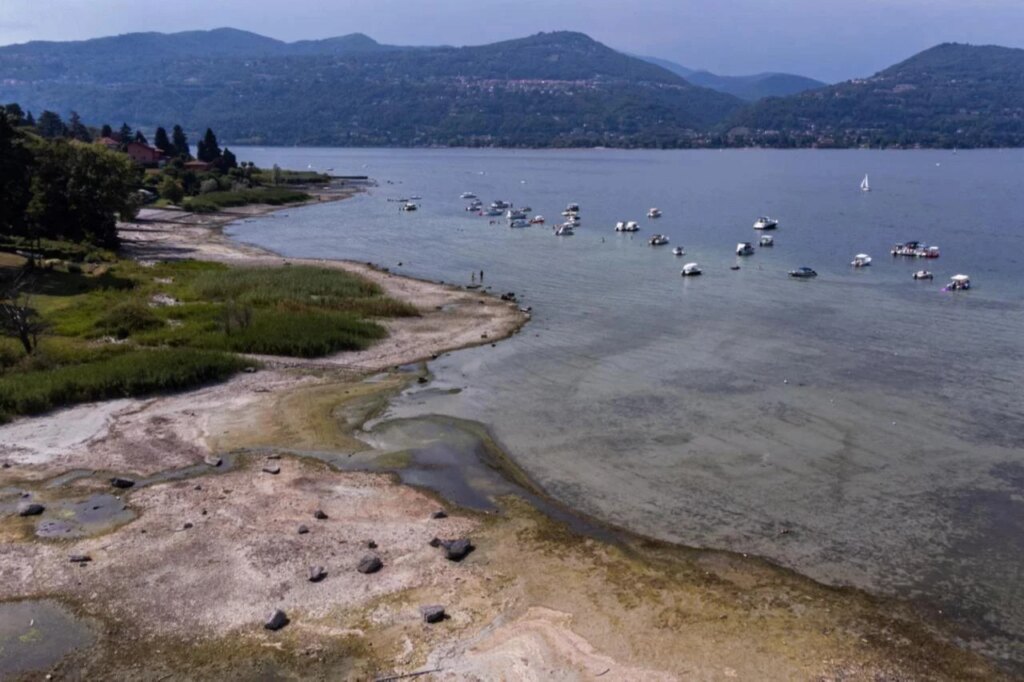Europe faces higher food prices as drought persists An aerial view of a large stretch of exposed shoreline and low water levels along Lake Maggiore in northern Italy on August 02, 2026. (AA Photo)
