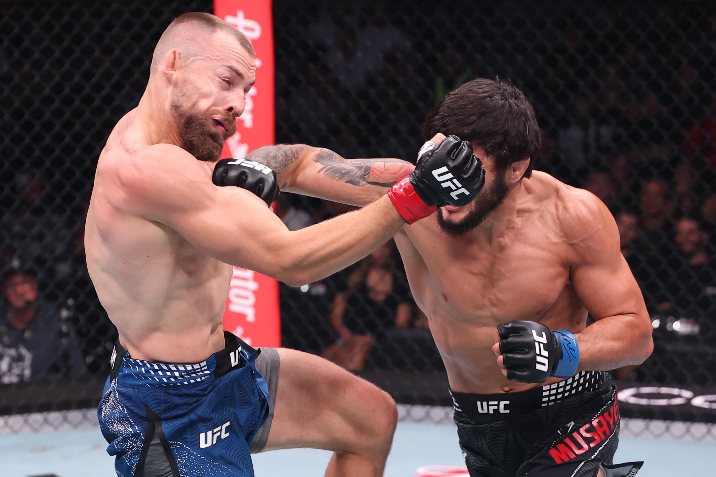 BELGRADE, SERBIA - AUGUST 01: Tofiq Musayev of Azerbaijan punches Ludovit Klein of Slovakia in a lightweight fight during the UFC Fight Night event at Belgrade Arena on August 01, 2026 in Belgrade, Serbia. (Photo by Ed Mulholland/Zuffa LLC)