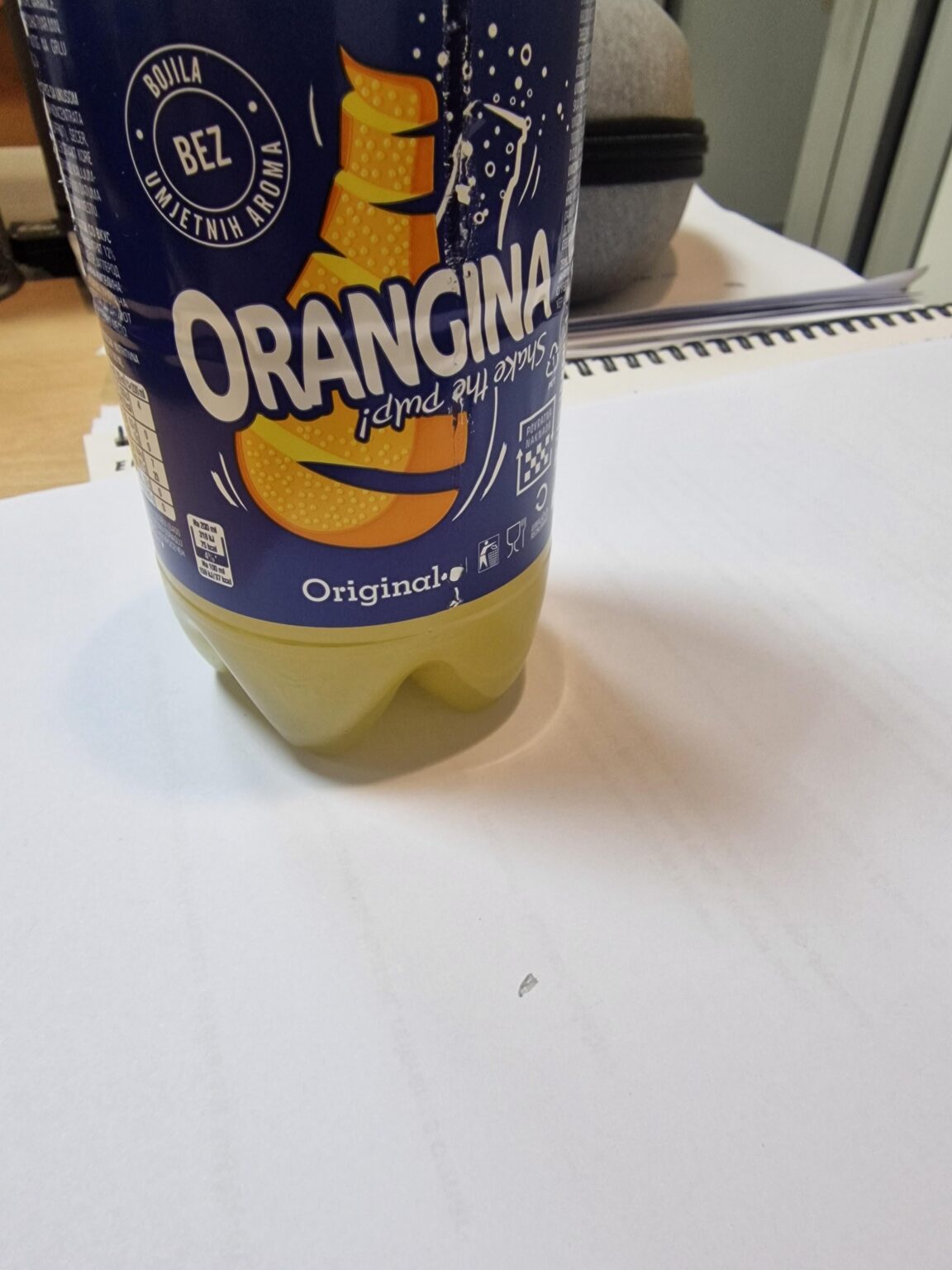 Orangina - may contain traces of tangerine, lemon and glass