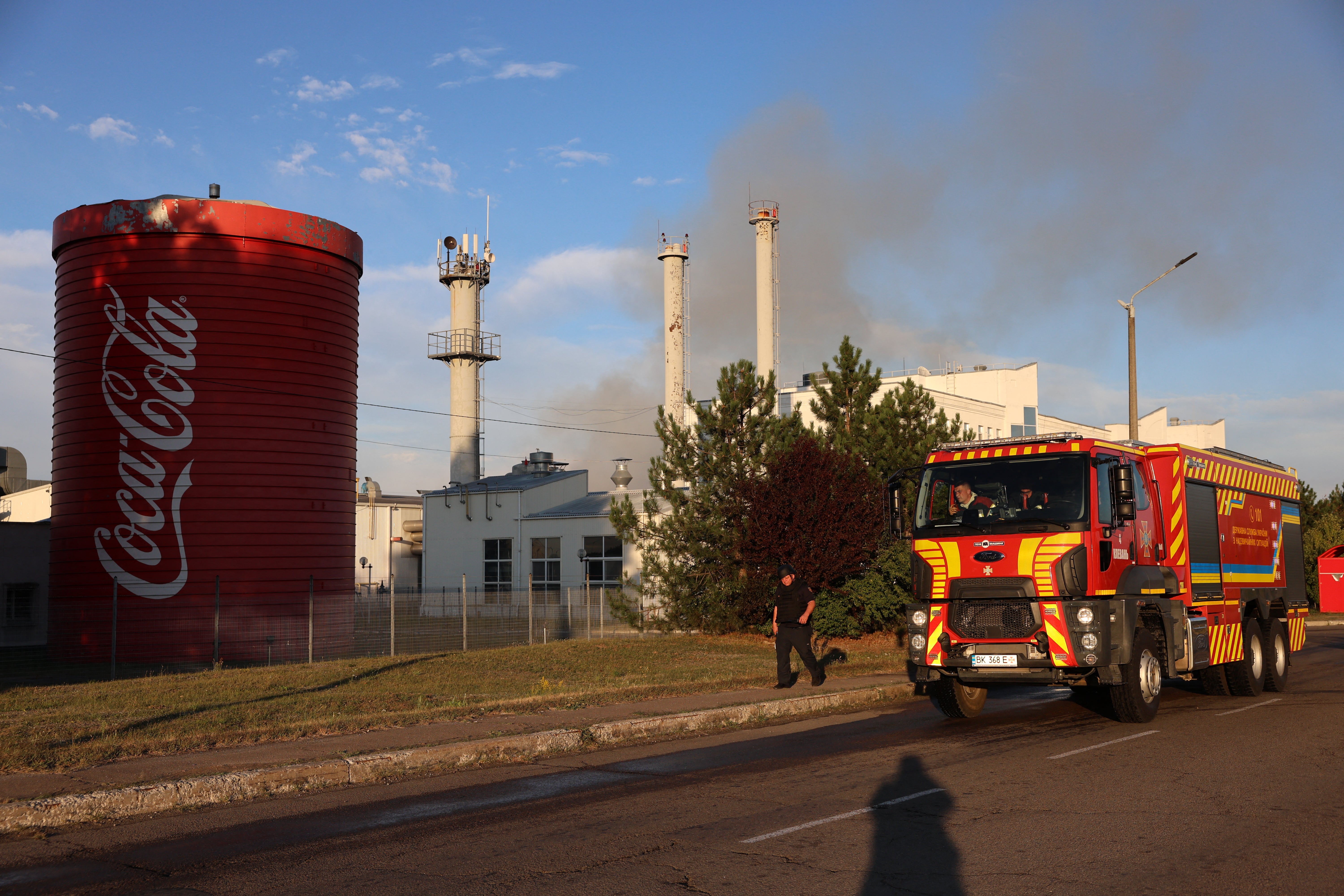 Ukrainian rescuers work at a Coca-Cola factory hit by a Russian strike, in the Kyiv region on September 3, 2026, amid the Russian invasion of Ukraine