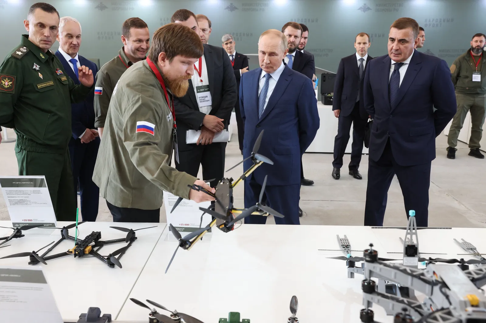 Vladimir Tkachuk, co-founder of Yekaterinburg-based drone manufacturer Uraldronzavod, demonstrates a drone to Russian President Vladimir Putin during the Russian leader's visit to the Special Technology Centre in Saint Petersburg.