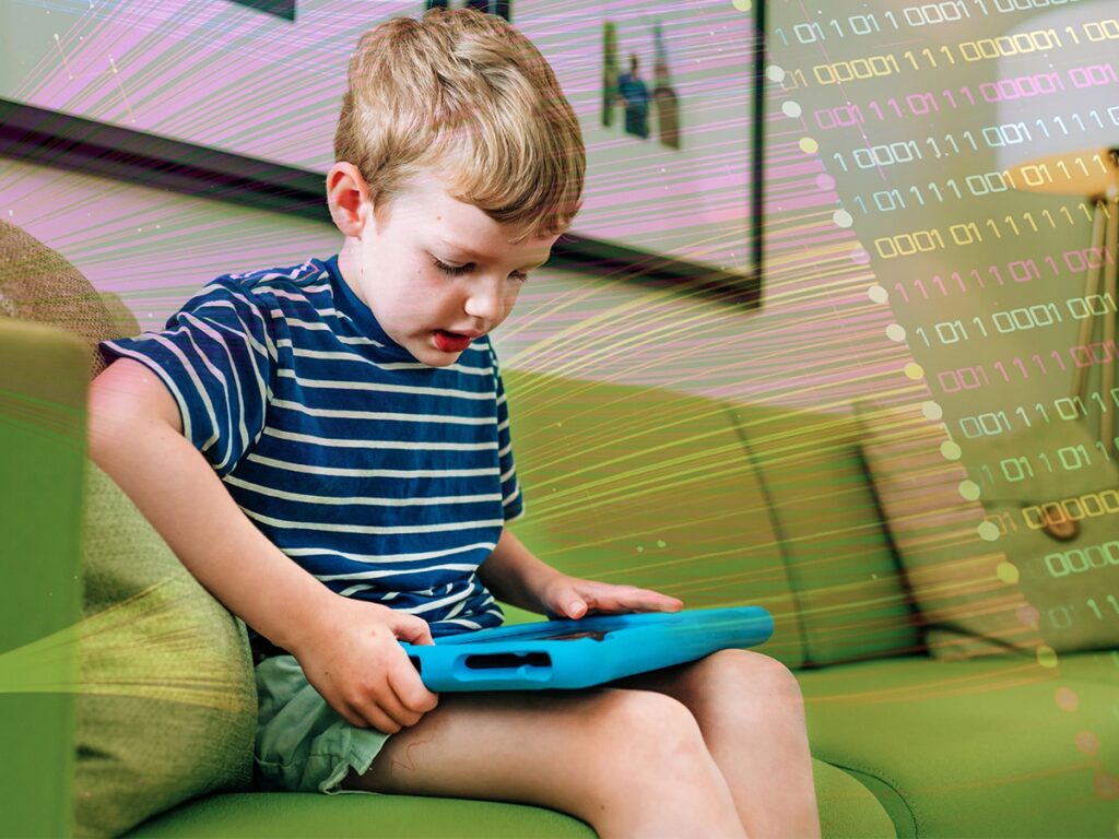 Back to school and AI: Tips for parents Elementary-aged child is sitting on sofa while working/playing on tablet computer at home, May 2025.
