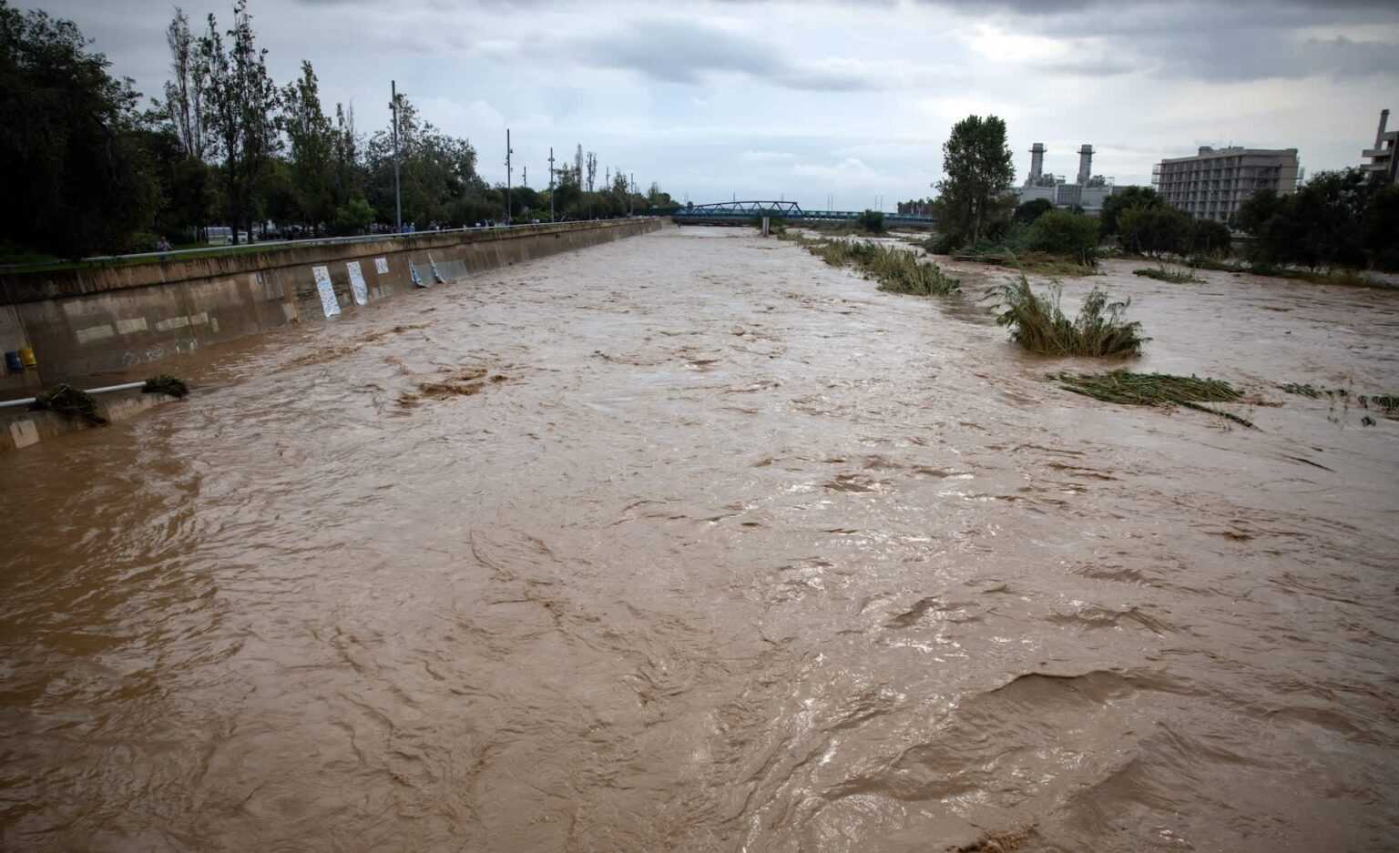 Two dead, 1 missing after flood hits Spain, and Catalonia tells residents to avoid travel A surging river.